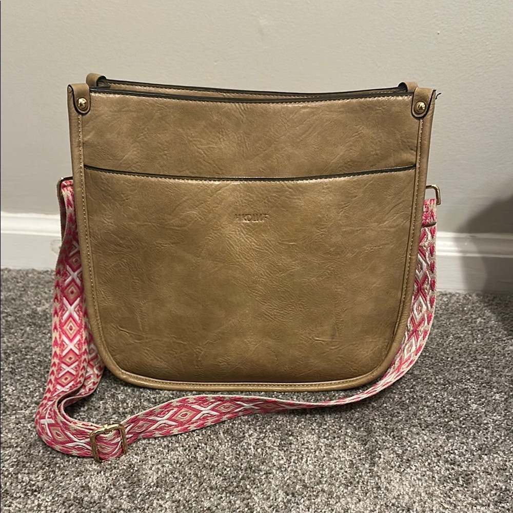 Stylish Tan Crossbody Bag with Pink Strap